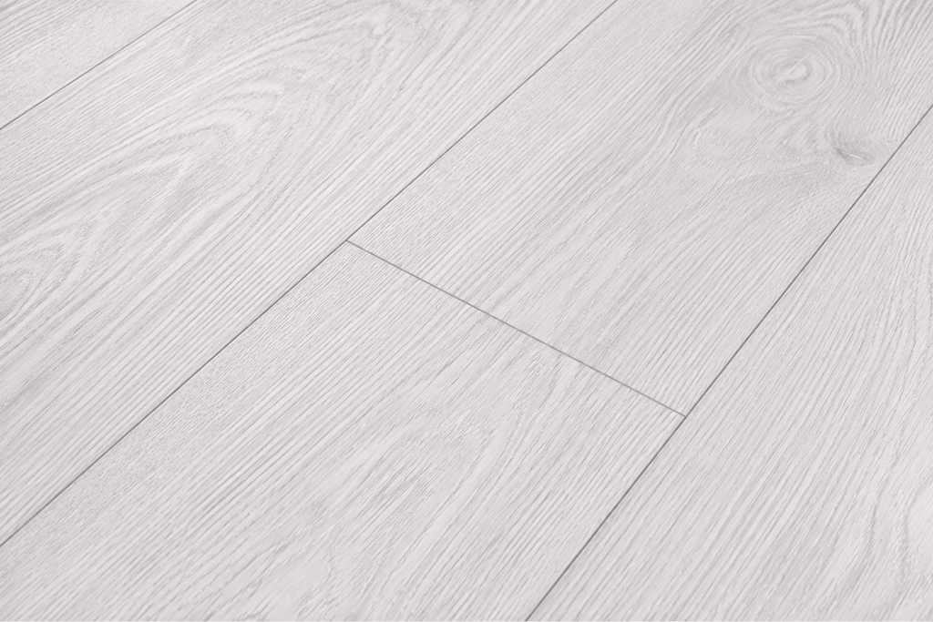 Close-up texture of ArmorCore Arctic Concrete Flooring showing natural concrete embossing and cool arctic grey detailing.
