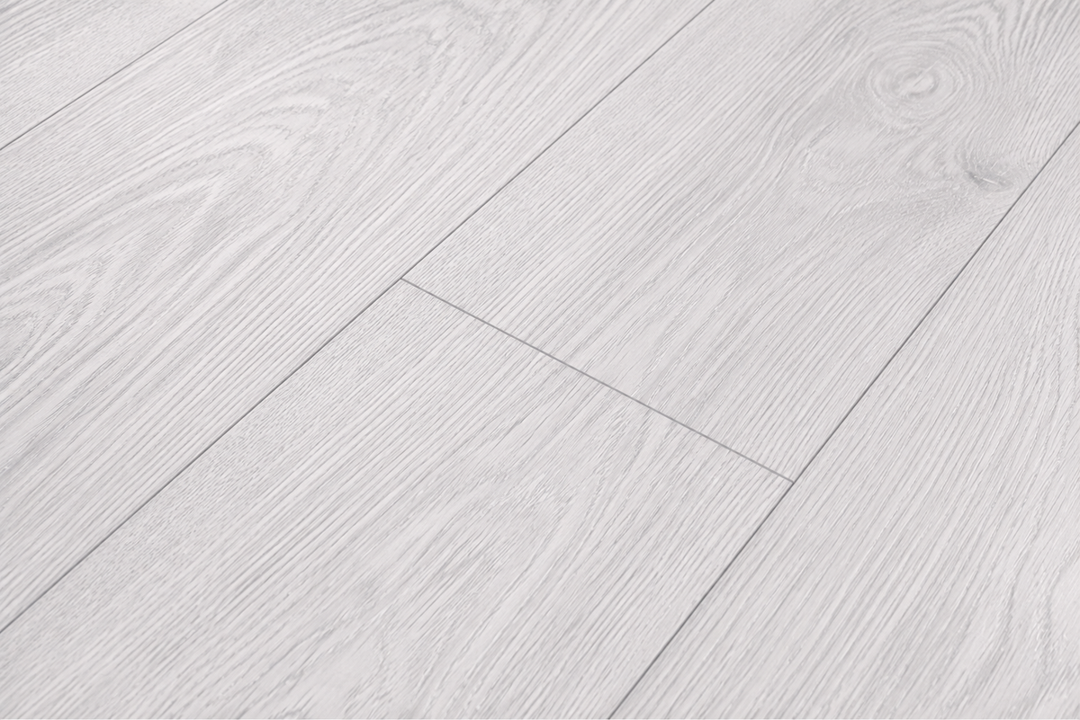Close-up texture of ArmorCore Arctic Concrete Flooring showing natural concrete embossing and cool arctic grey detailing.