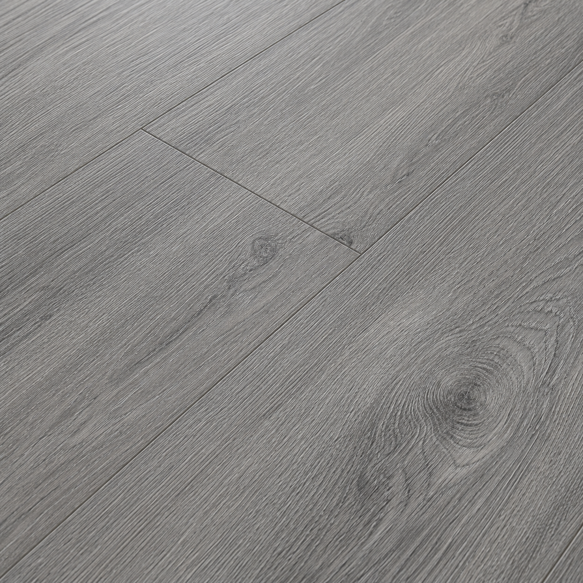 Close-up of ArmorCore Ashford Grey Flooring highlighting authentic grey ash grain, embossed surface texture, and natural matte finish.