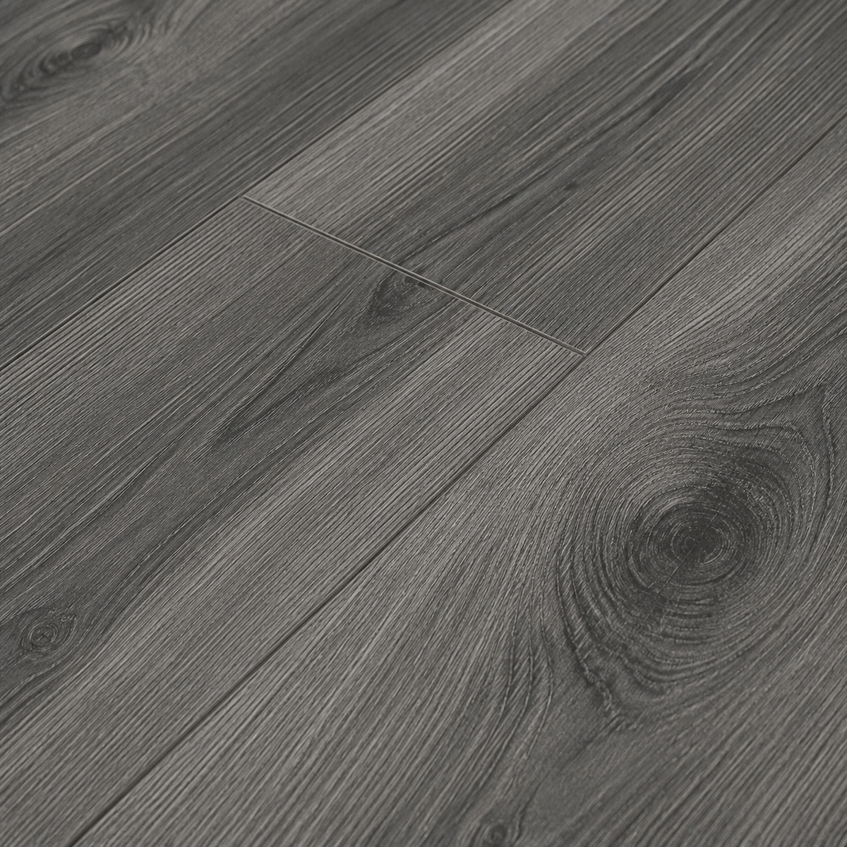 Macro close-up of ArmorCore Glacier Ash Flooring highlighting realistic ash grain, embossed surface texture, and elegant matte finish.