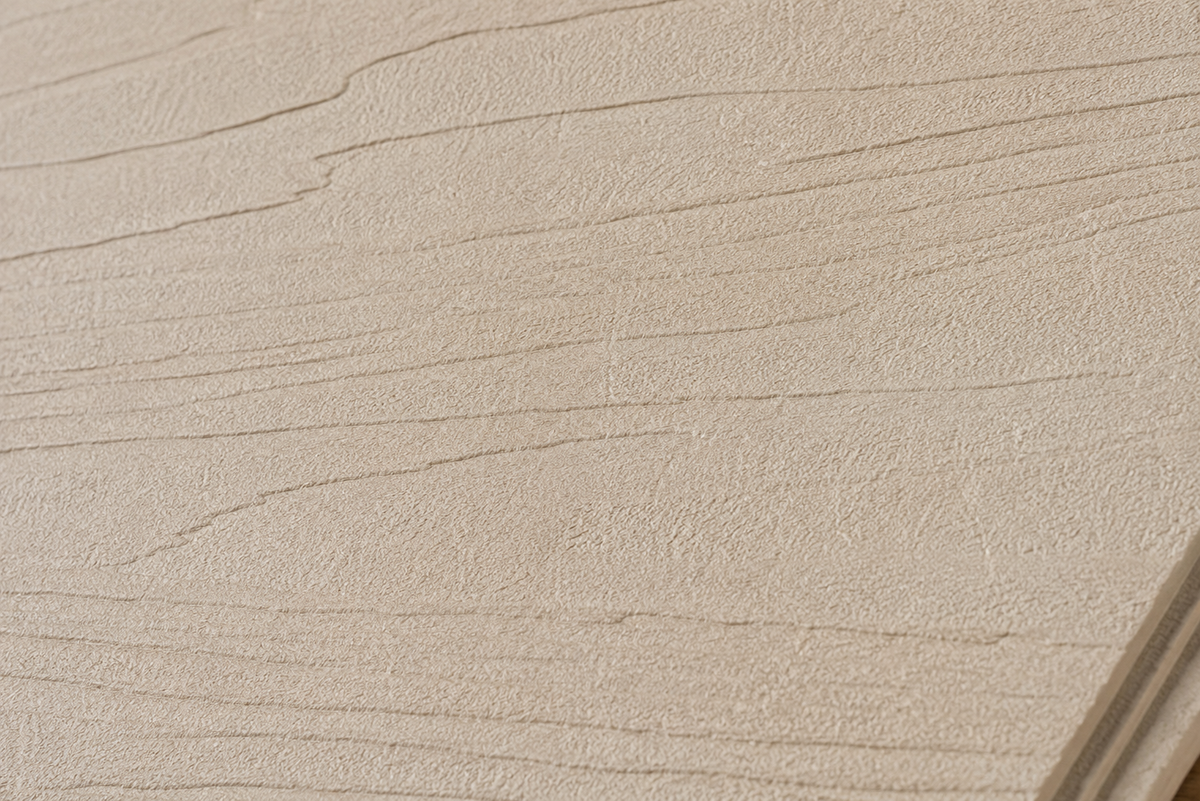 Close-up texture of ArmorCore Glacier Ridge Wall Panel showing realistic 3D gneiss embossing and layered stone detailing.