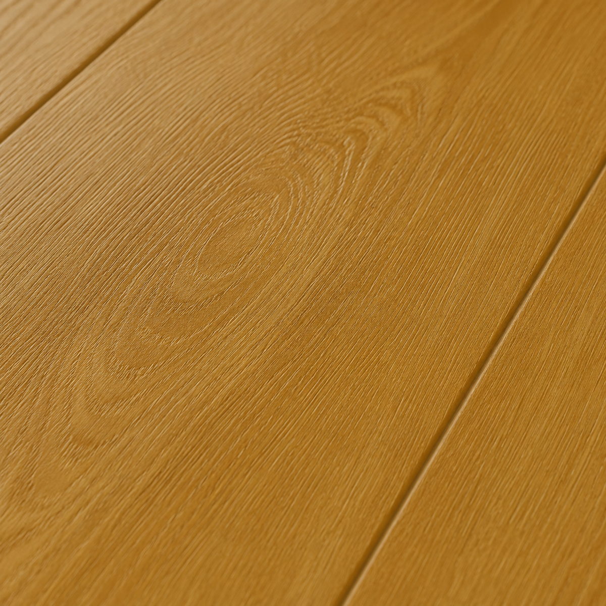Close-up of ArmorCore Heritage Walnut Flooring highlighting natural walnut grain, matte finish, and embossed wood texture.