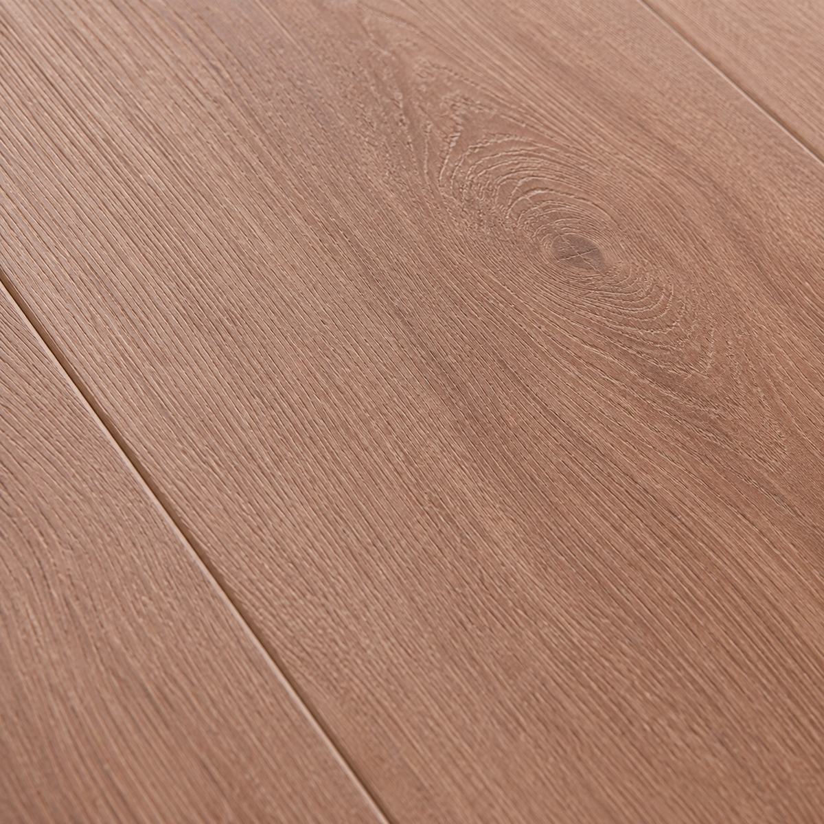 Close-up of ArmorCore Verona Walnut Flooring highlighting realistic European walnut grain and embossed surface texture.