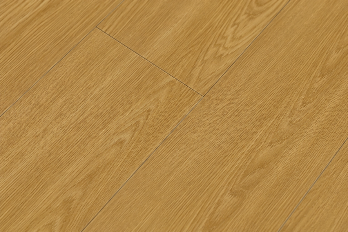 Close-up texture of ArmorCore Woodland Pine Flooring showing authentic pine grain and Embossed-In-Register finish.